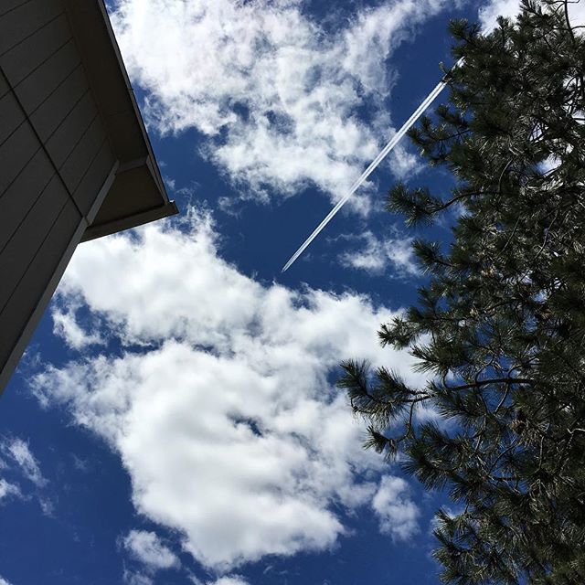 Airplane cloudy sky bullseye