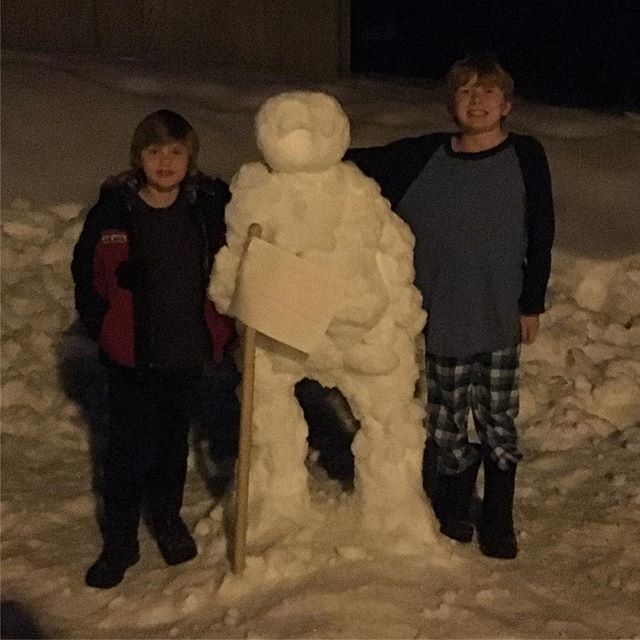 snow astronaut in our yard