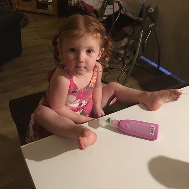 Toddler with feet on counter